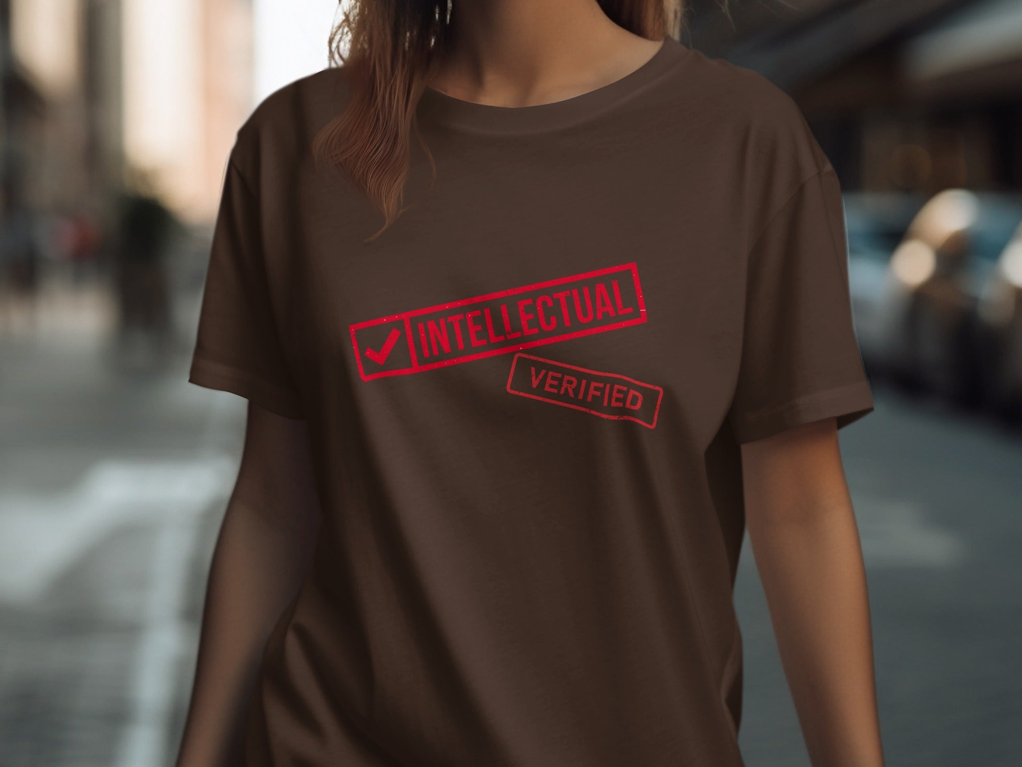 Brown t-shirt with red "Intellectual" and "Verified" stamp graphics.