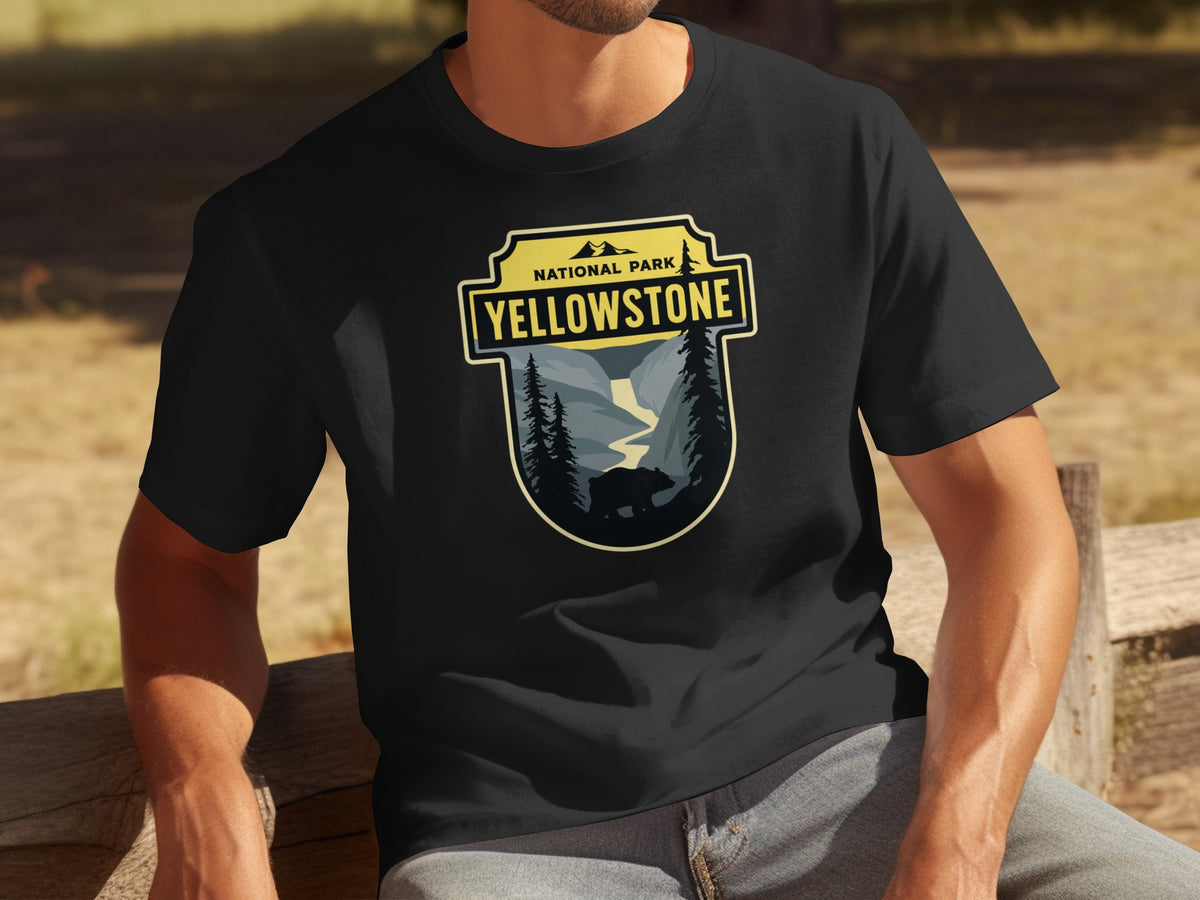 Black t-shirt featuring a Yellowstone National Park emblem with a bear and mountain scene.