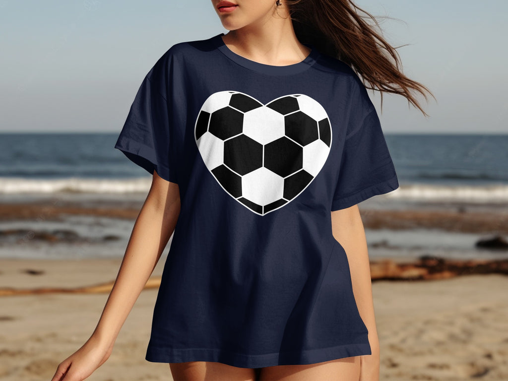 Navy t-shirt with a white and black heart-shaped soccer ball graphic.