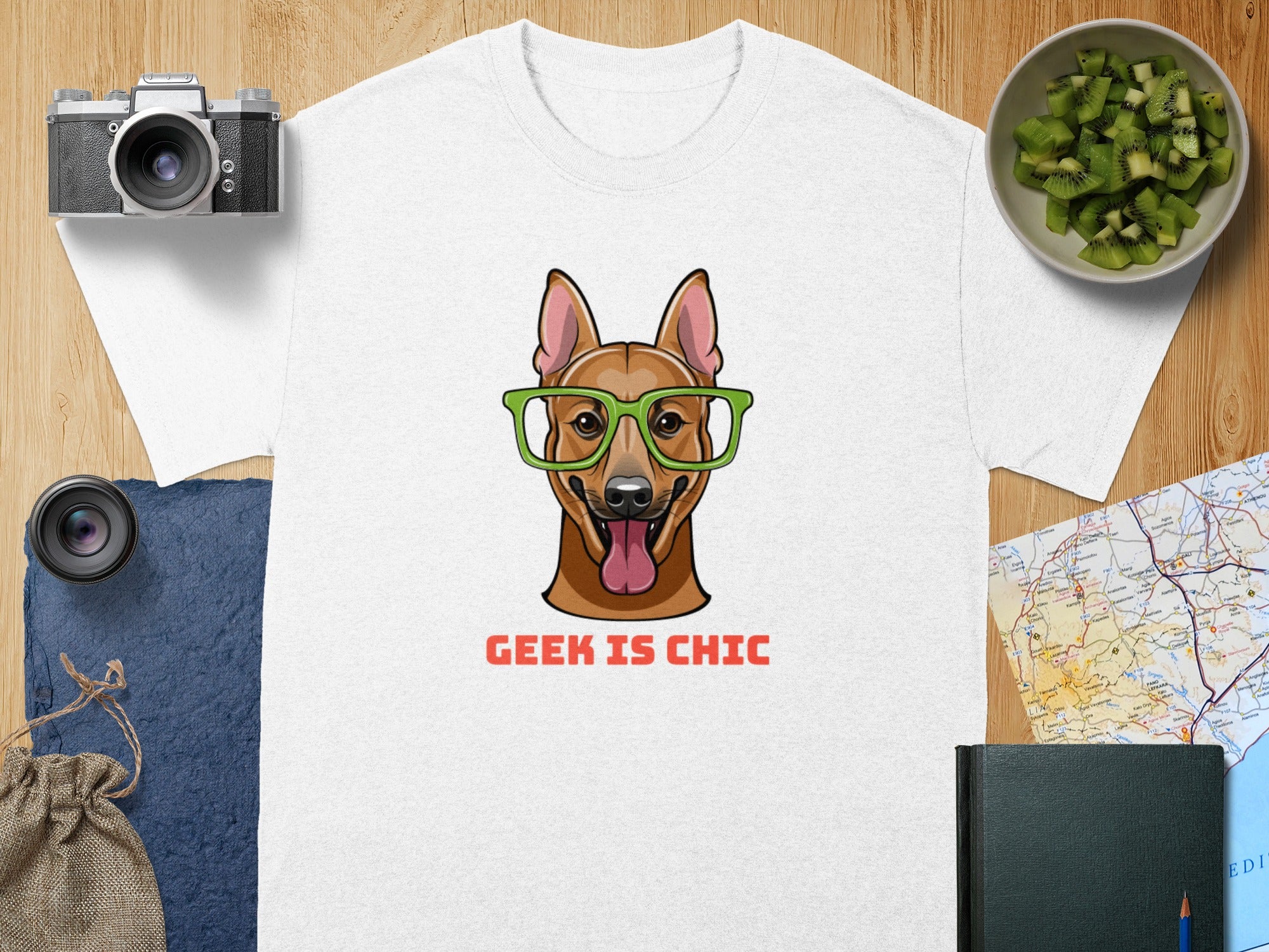 White t-shirt with cartoon dog wearing glasses and "GEEK IS CHIC" text.