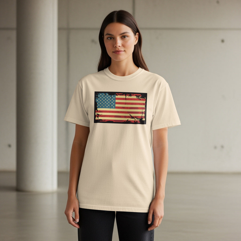 Cream t-shirt with distressed American flag graphic centered on chest.