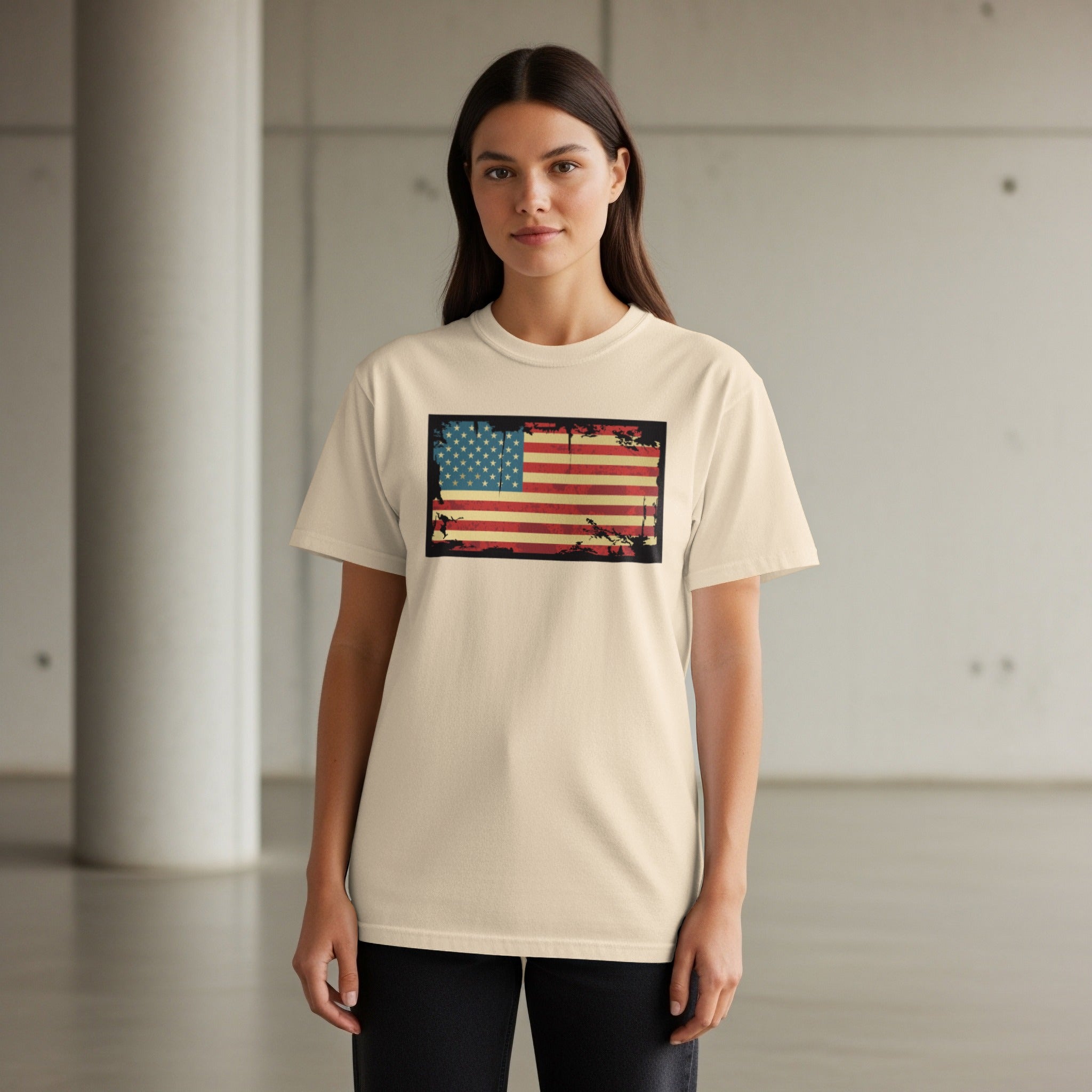 Cream t-shirt with distressed American flag graphic centered on chest.