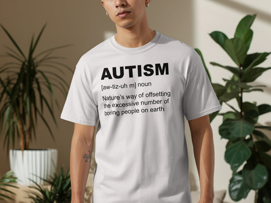 White t-shirt with "AUTISM" and its definition printed in black text.