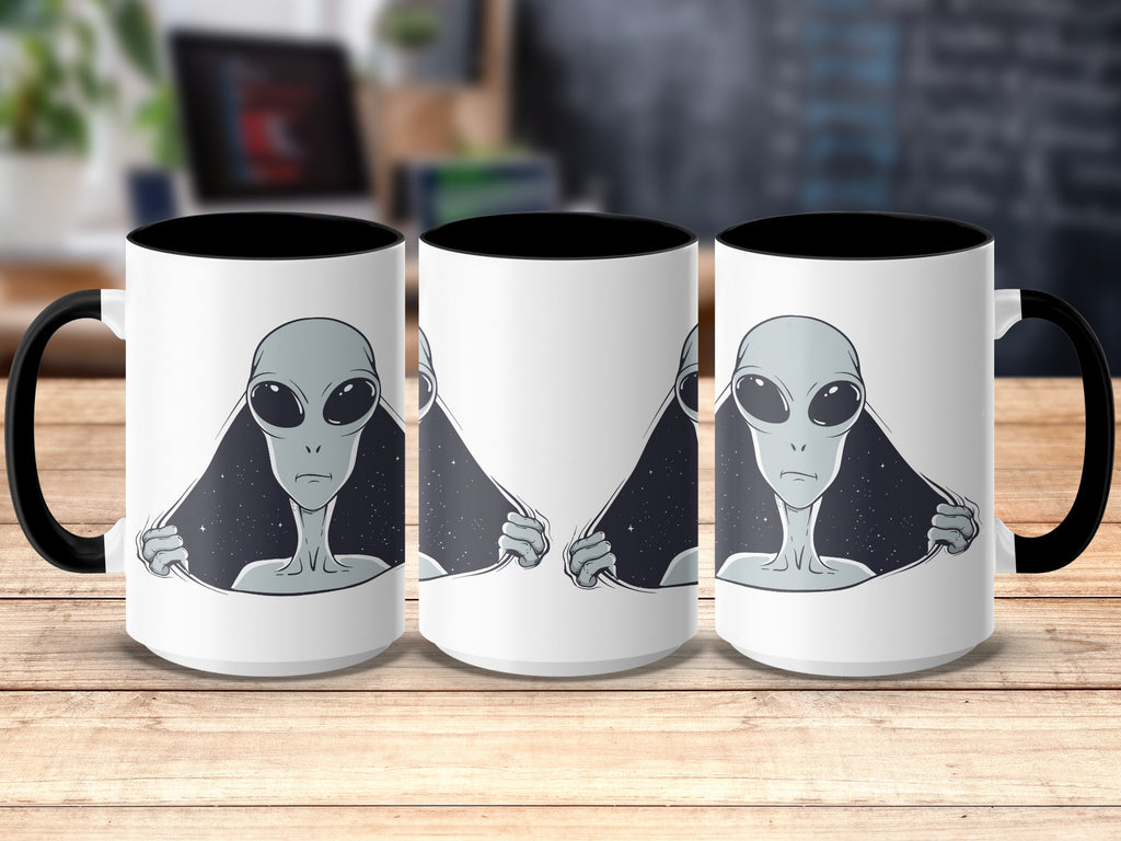 Three mugs with a grey alien face peeking through star-filled space.
