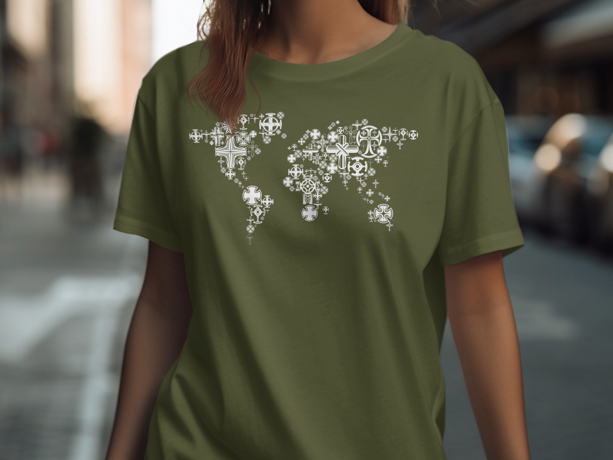 Olive green t-shirt with a white world map graphic made of various crosses.