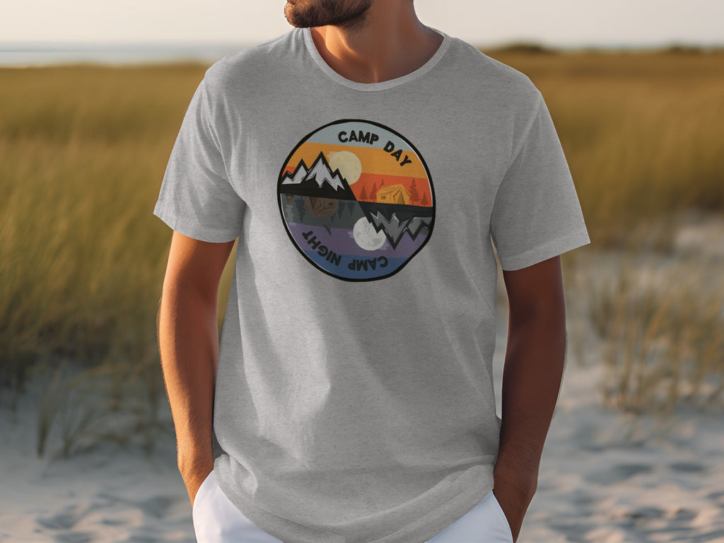 Grey t-shirt with circular "Camp Day Night" graphic showing day and night camping scenes.
