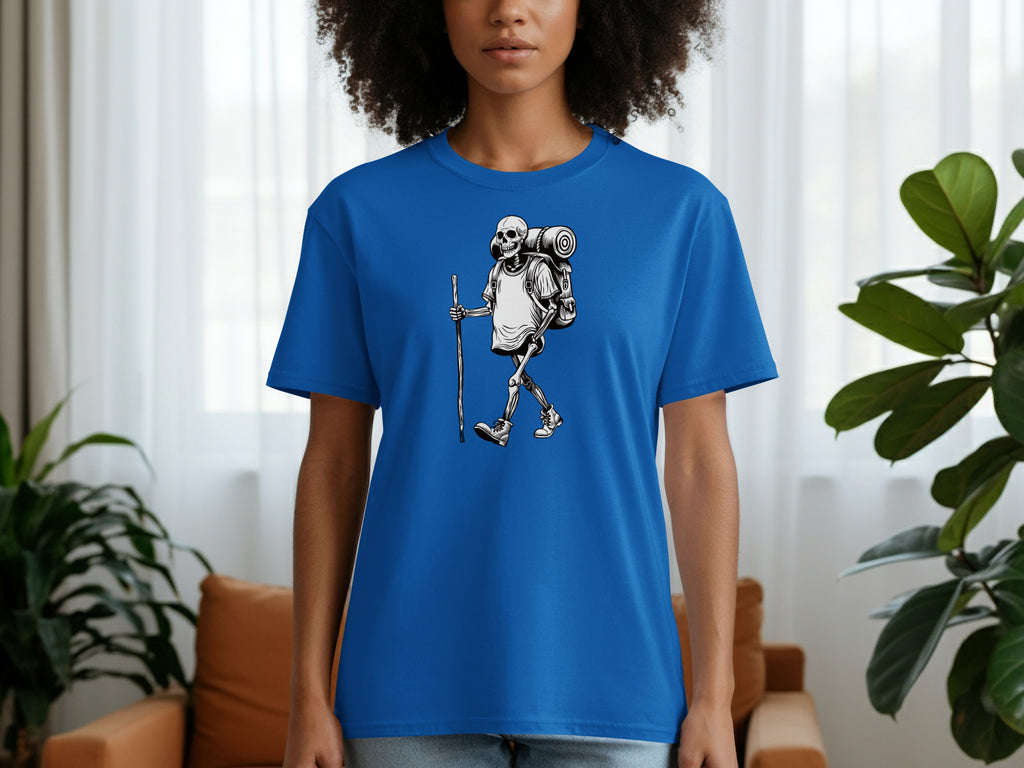 Blue t-shirt with a skeleton hiker graphic carrying a backpack and walking stick.