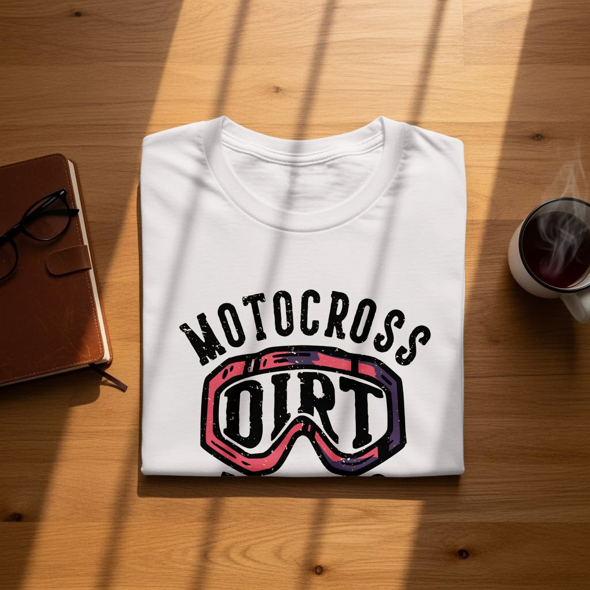 White t-shirt with "Motocross Dirt" text and goggles graphic.