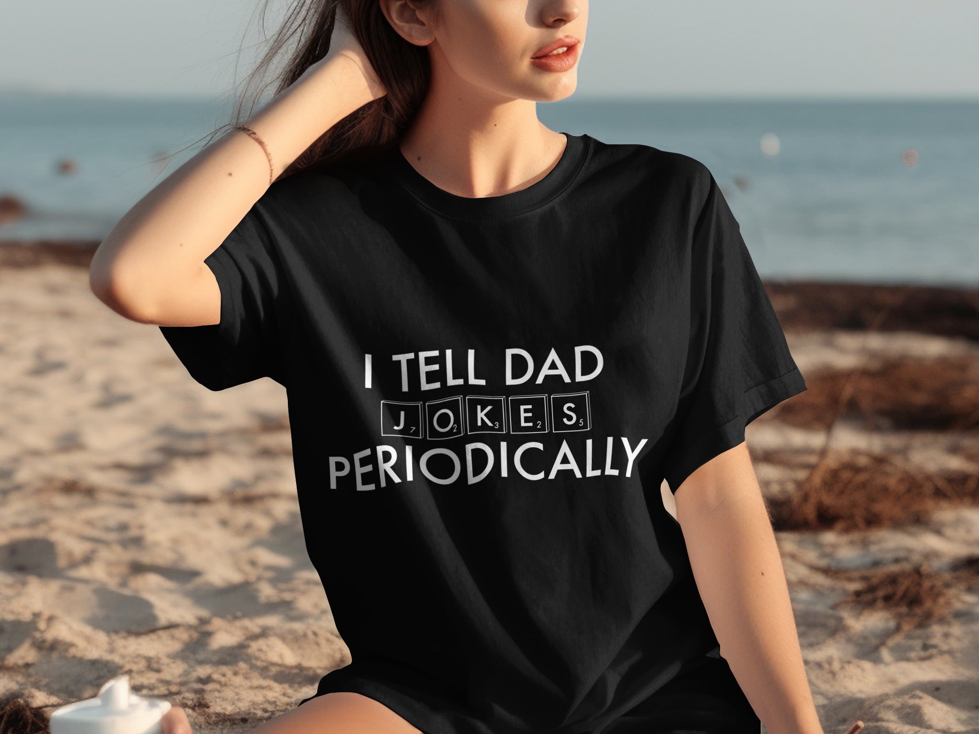 Black t-shirt with "I TELL DAD JOKES PERIODICALLY" text.