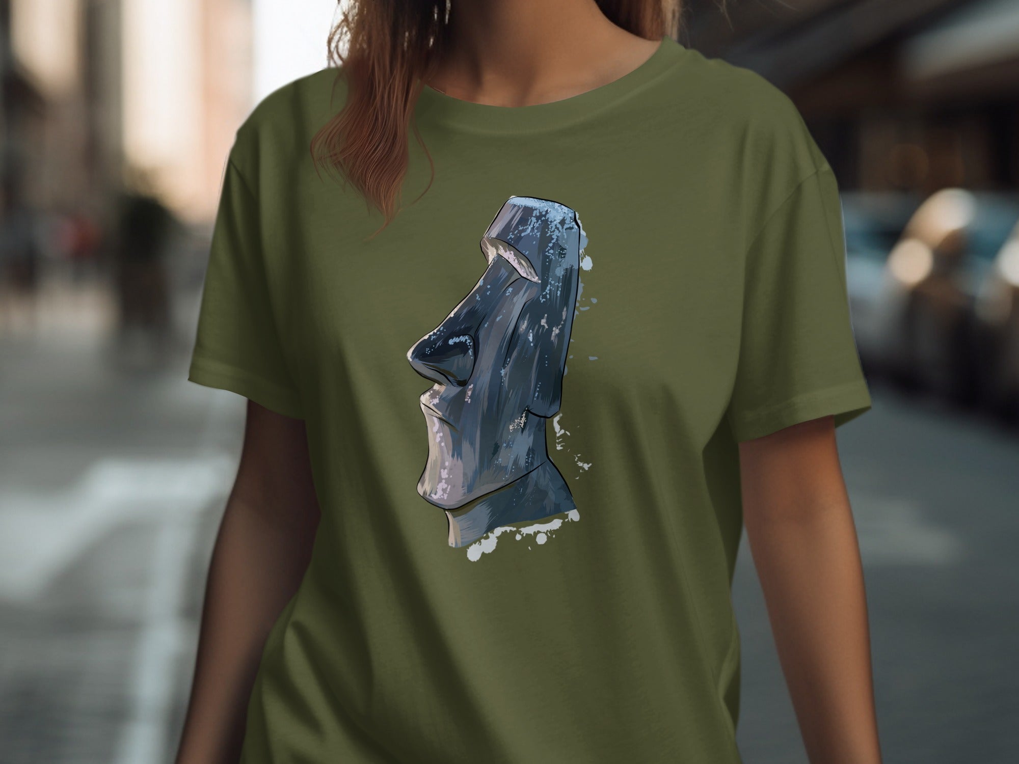 Moai statue graphic printed on a dark olive green t-shirt.