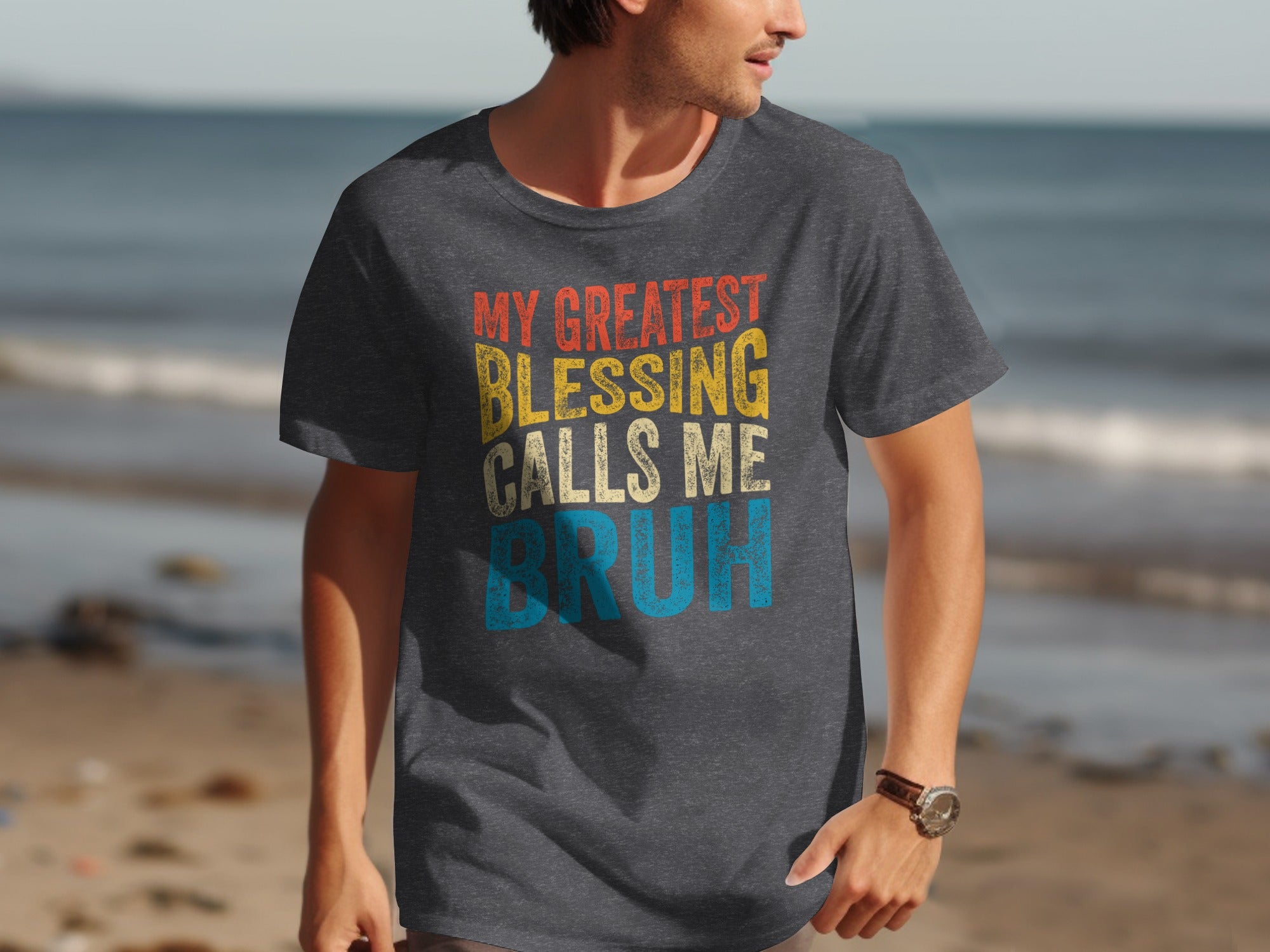 Dark gray t-shirt with text "MY GREATEST BLESSING CALLS ME BRUH".