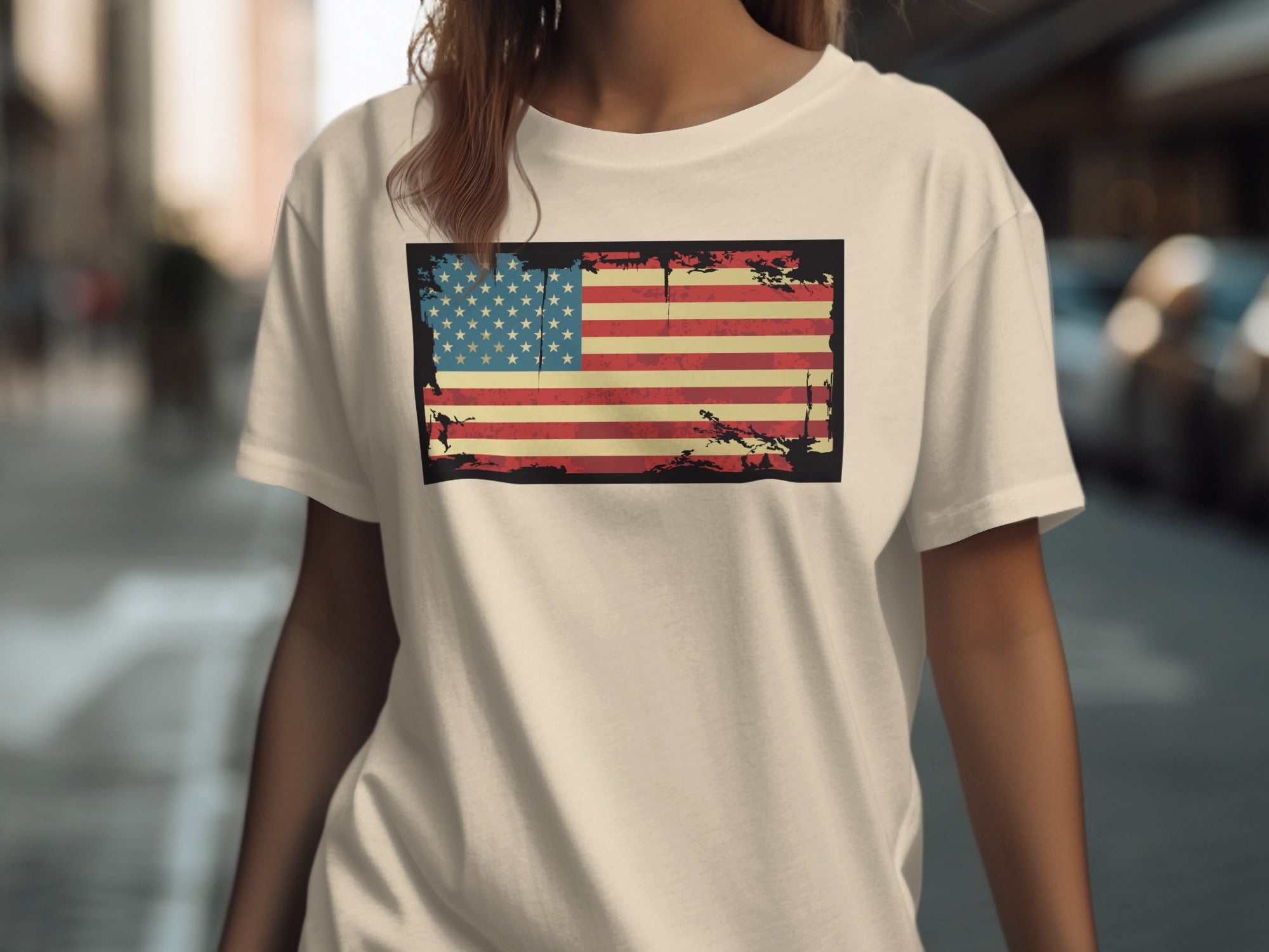 Cream t-shirt with distressed vintage American flag graphic.