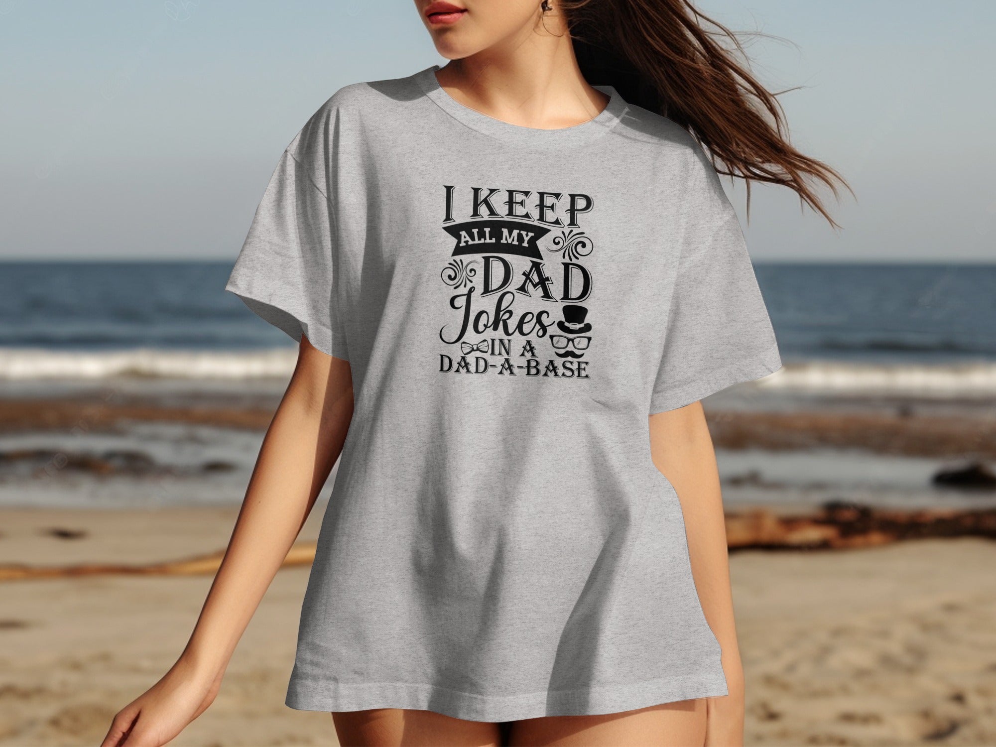 Gray t-shirt with text "I keep all my dad jokes in a dad-a-base".