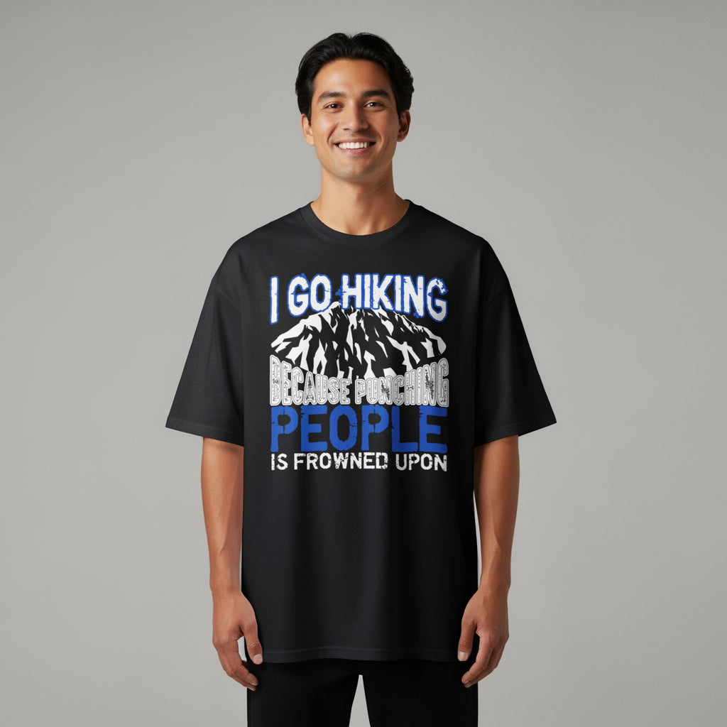 Black t-shirt with text "I GO HIKING BECAUSE PUNCHING PEOPLE IS FROWNED UPON".