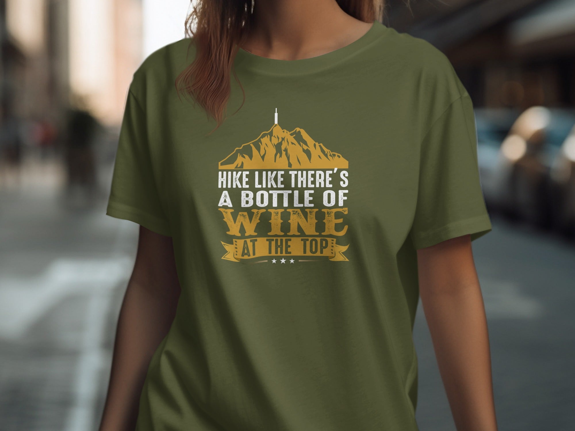 Olive green t-shirt with text "Hike like there's a bottle of wine at the top."