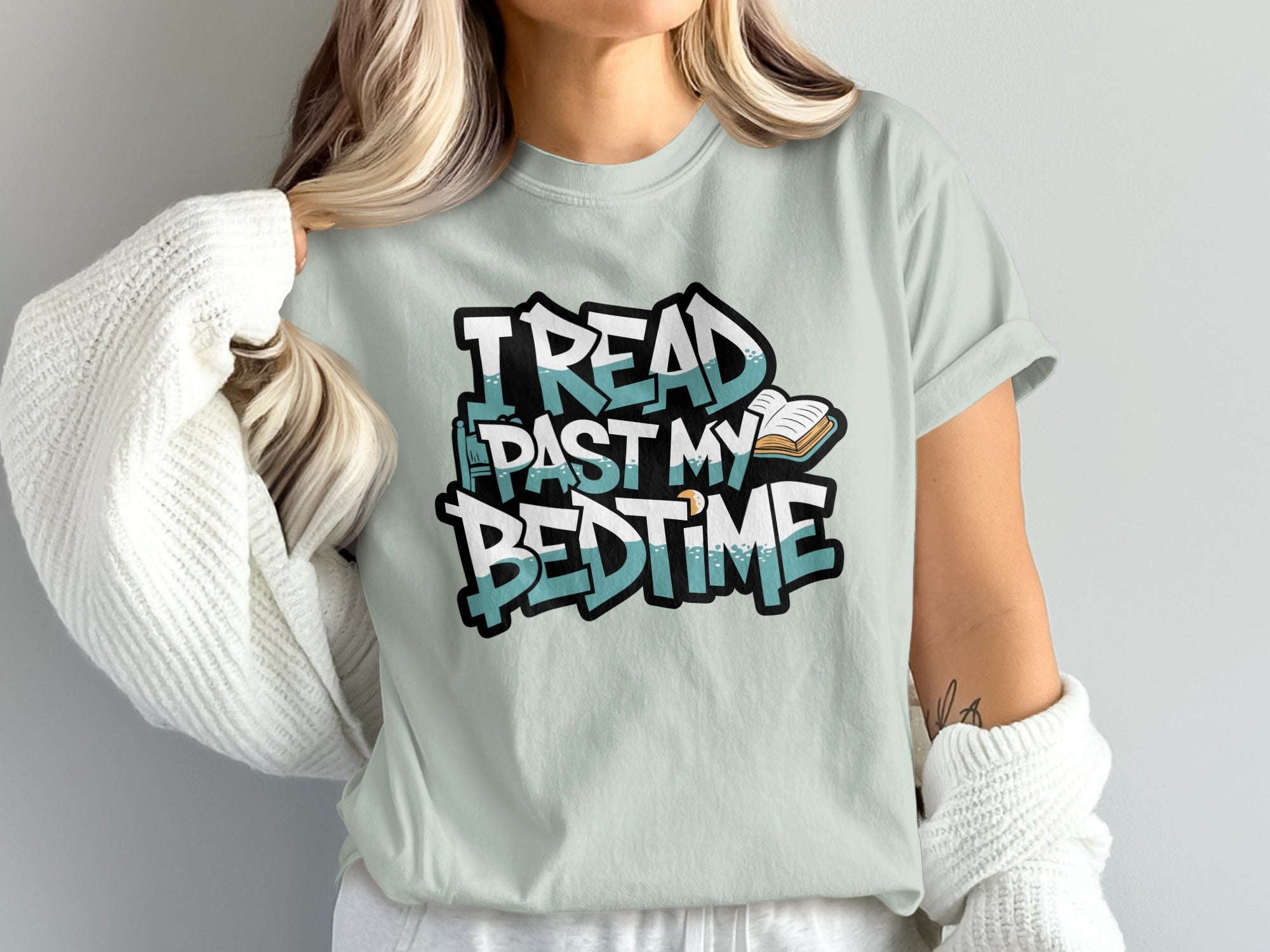 T-shirt with "I READ PAST MY BEDTIME" text and an open book graphic.