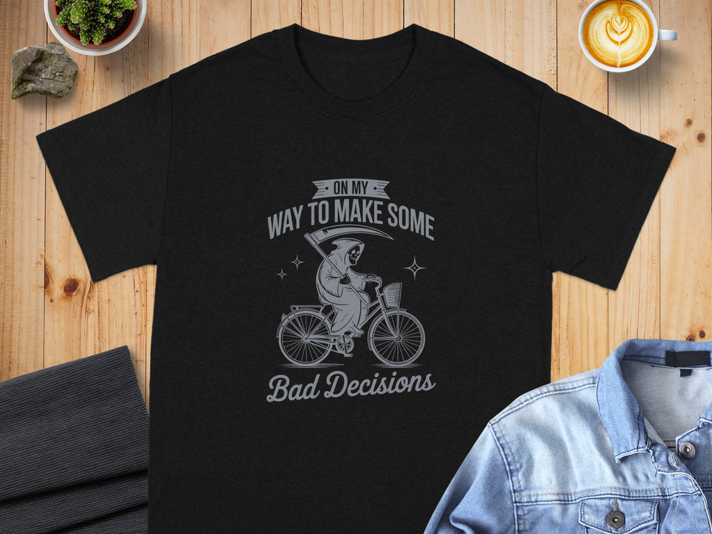 Black t-shirt with grim reaper on bicycle graphic and text \"On My Way To Make Some Bad Decisions\".