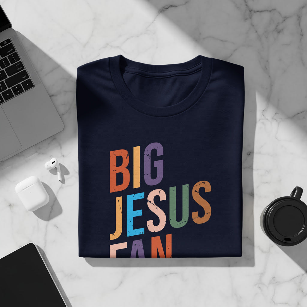 Navy t-shirt with distressed multicolored text reading "BIG JESUS FAN".