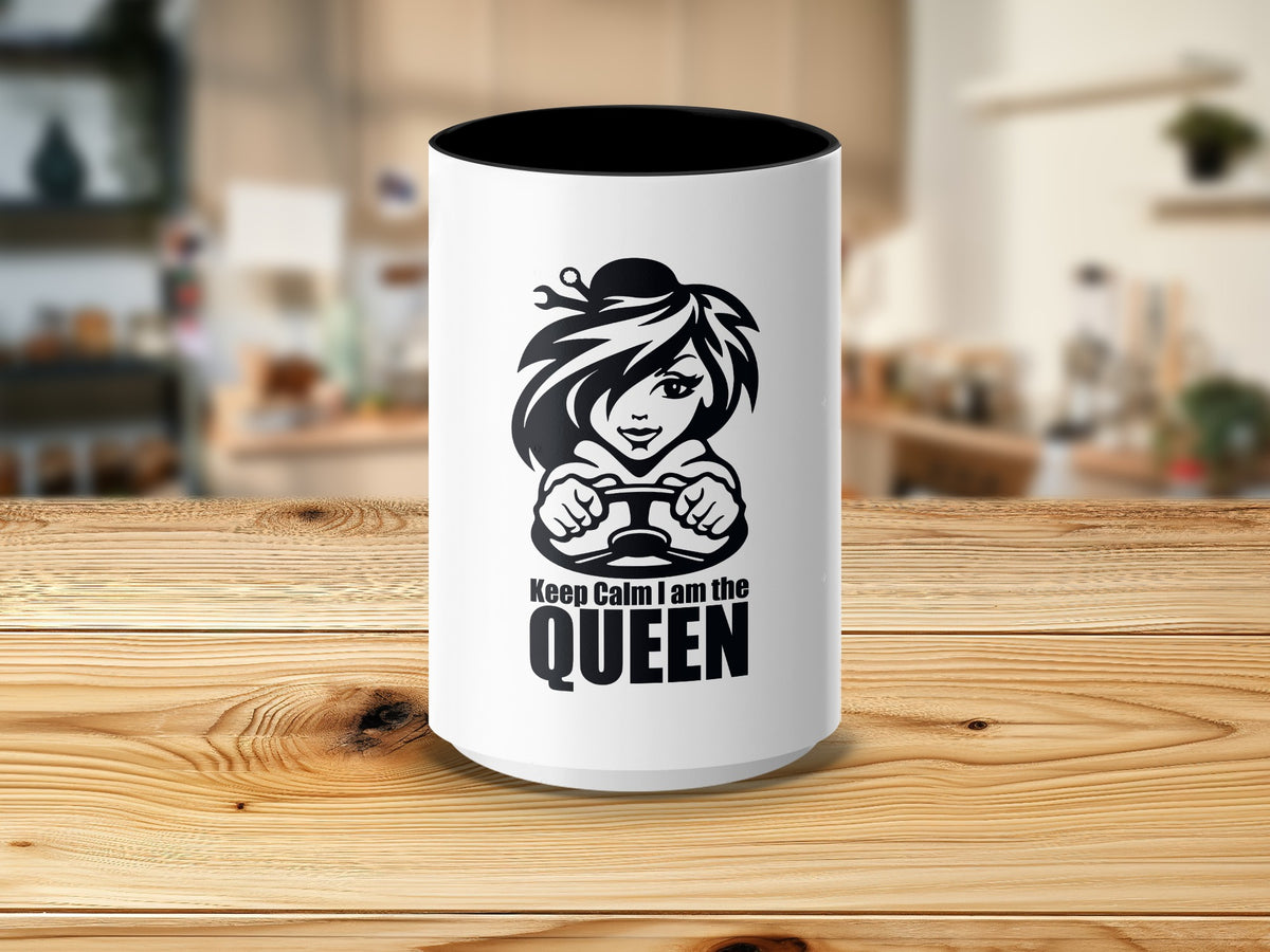 White mug with black design of a woman driving, "Keep Calm I am the QUEEN".