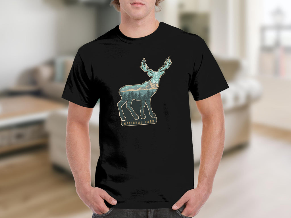 Black t-shirt with a stylized deer silhouette filled with a national park landscape and text.