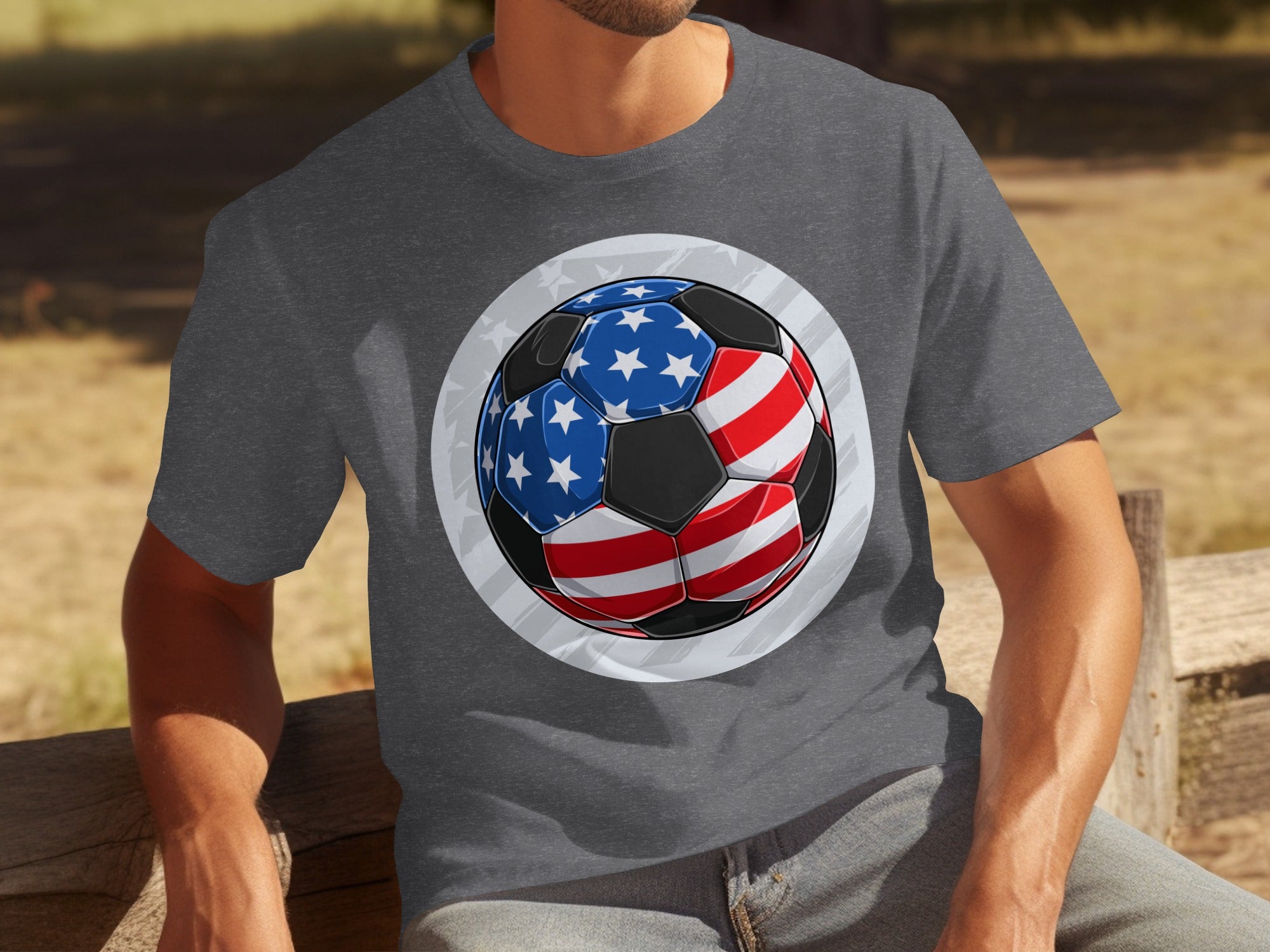 Graphic of soccer ball with American flag design on a dark gray t-shirt.