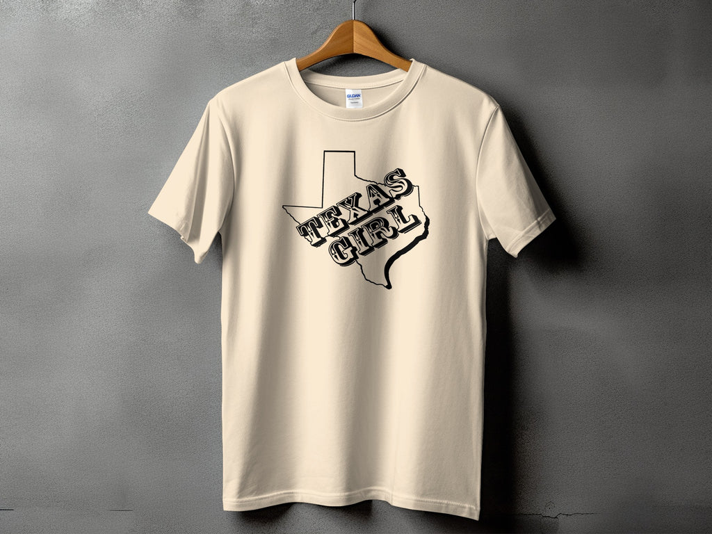 Cream t-shirt with black outline of Texas and "Texas Girl" text graphic.