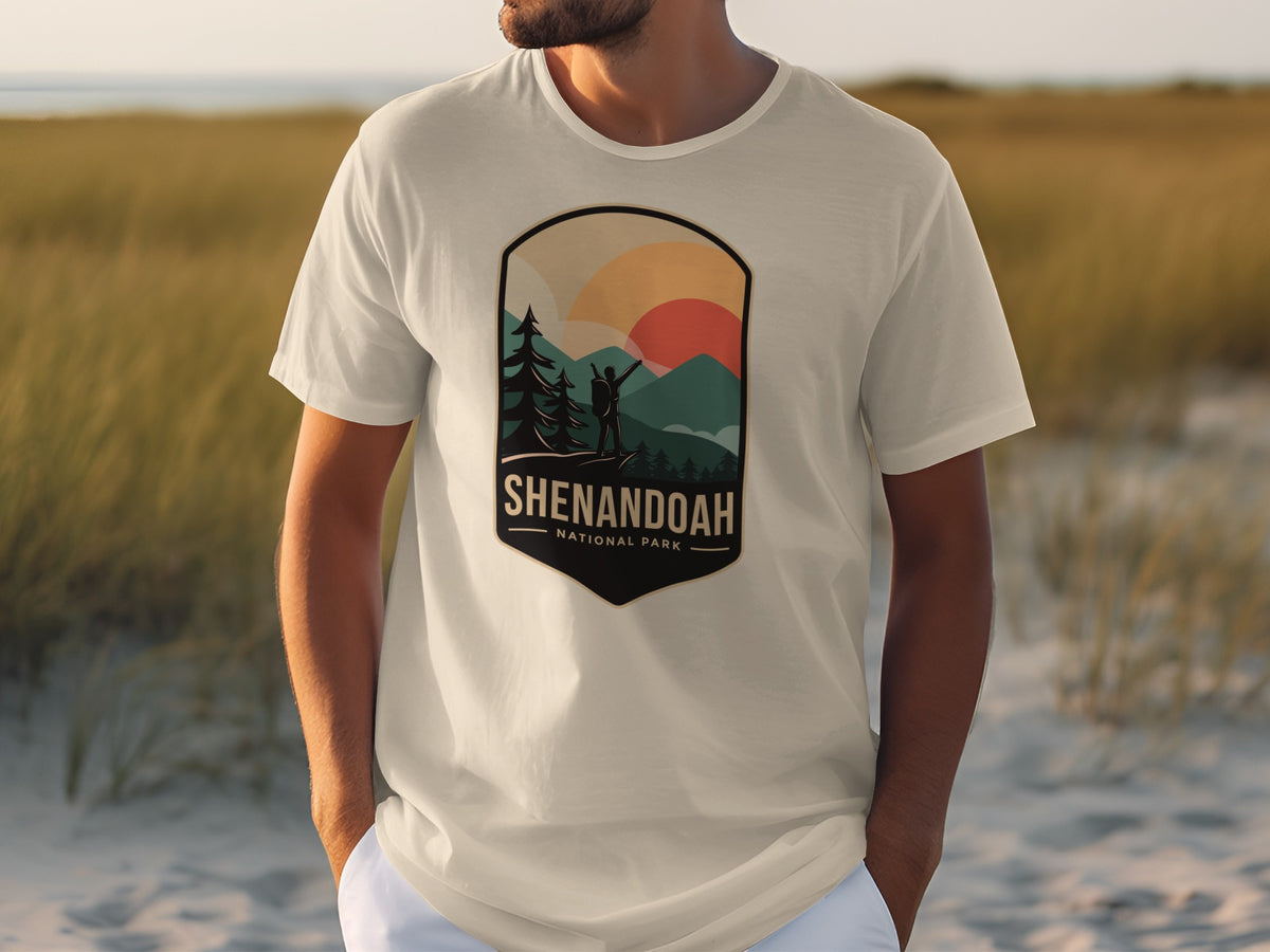 Shenandoah National Park graphic on a t-shirt with a hiker and sunset design.