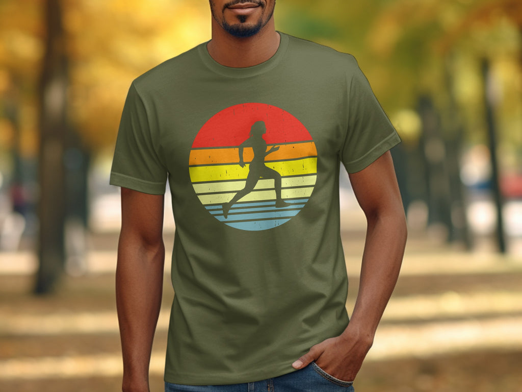 Olive green t-shirt with runner silhouette on a retro striped sunset circle.
