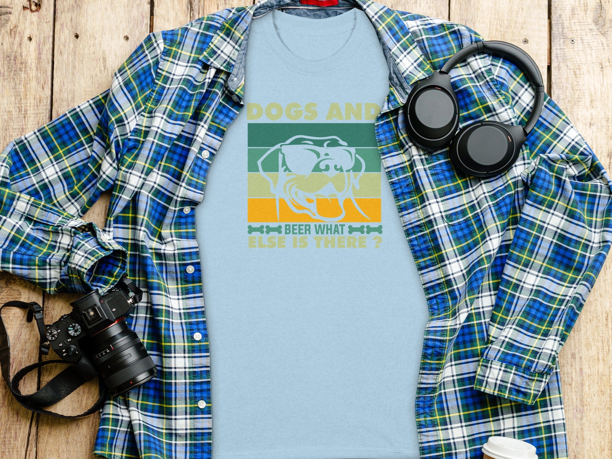 Light blue t-shirt with sunglasses-wearing dog graphic and text.