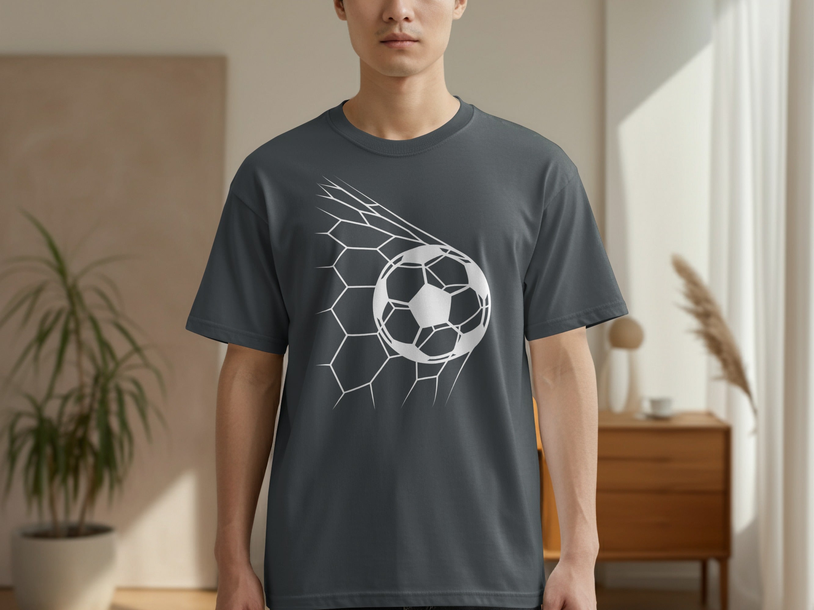 Charcoal t-shirt with a white soccer ball in a net graphic.