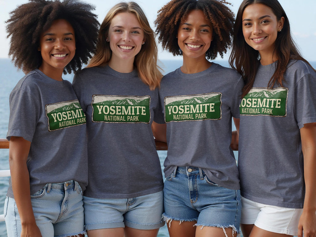 Four women wear grey t-shirts with "Yosemite National Park" graphics.