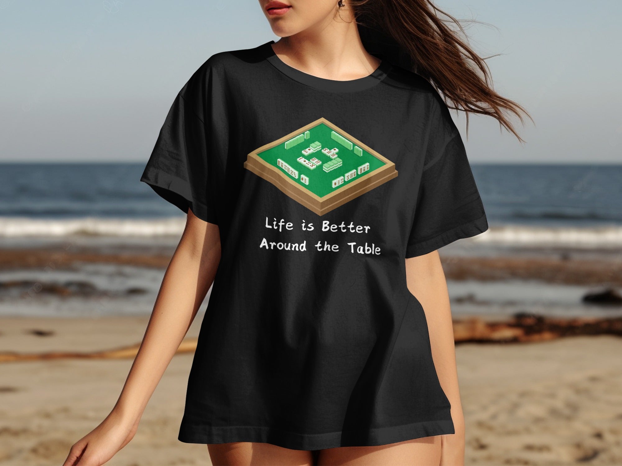 Black t-shirt with mahjong tiles graphic and text "Life is Better Around the Table".