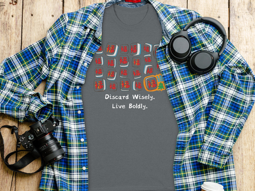 Grey t-shirt with mahjong tiles and text "Discard Wisely. Live Boldly."