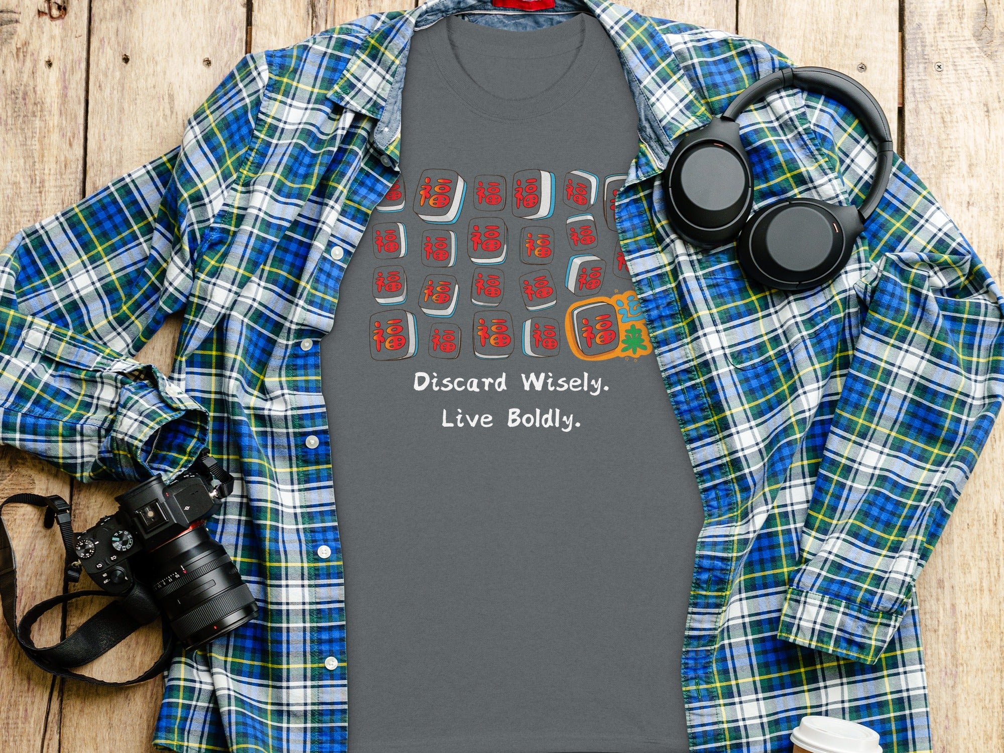 Grey t-shirt with mahjong tiles and text "Discard Wisely. Live Boldly."