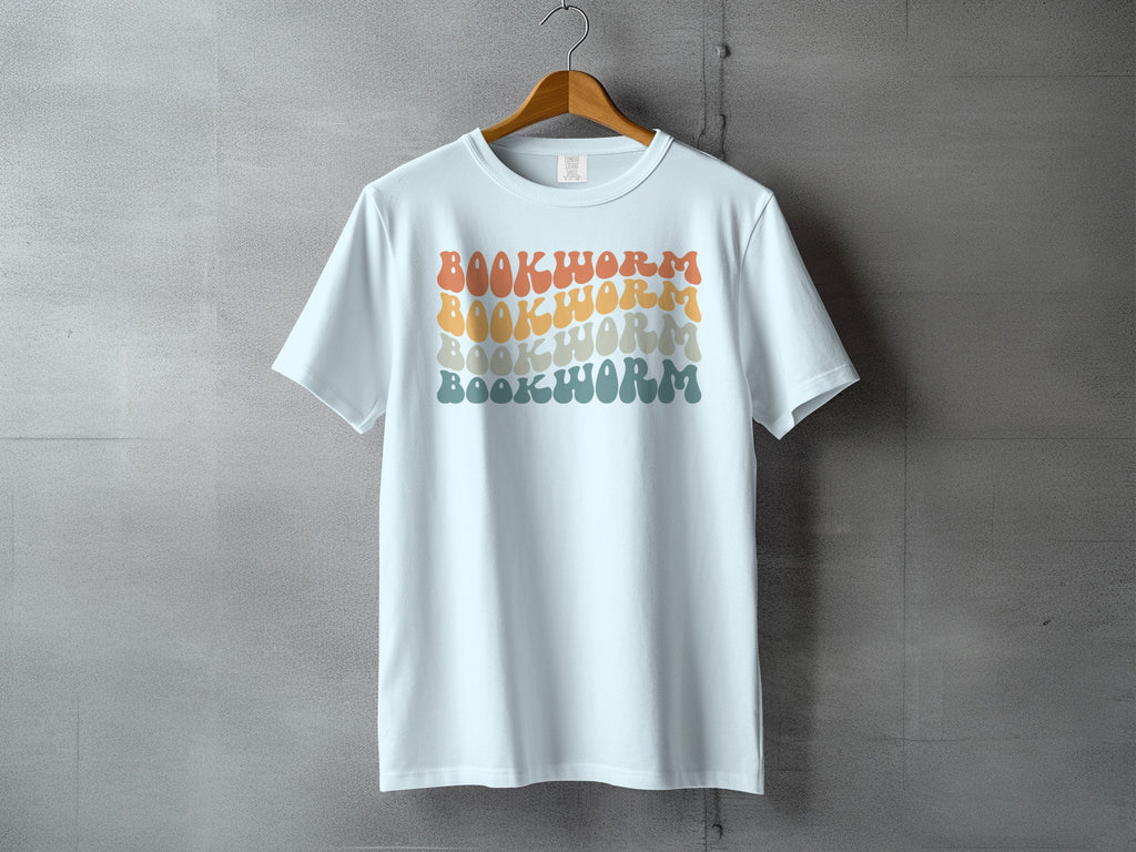 White t-shirt with "BOOKWORM" repeated in retro, wavy font and varied colors.