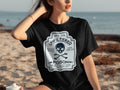 Black t-shirt with "UNFILTERED POISON" skull and crossbones graphic, witch's grade.