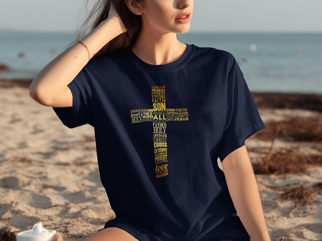 Dark blue t-shirt with gold text forming a cross with religious words.