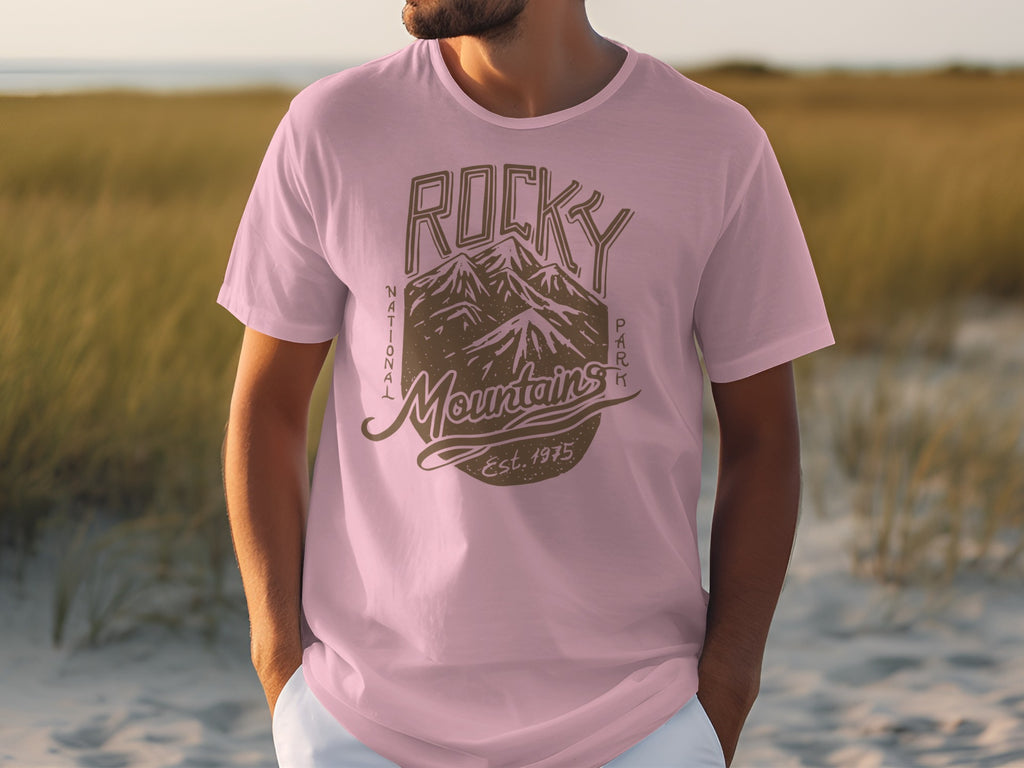 Pink t-shirt with "Rocky Mountains National Park Est. 1975" graphic.