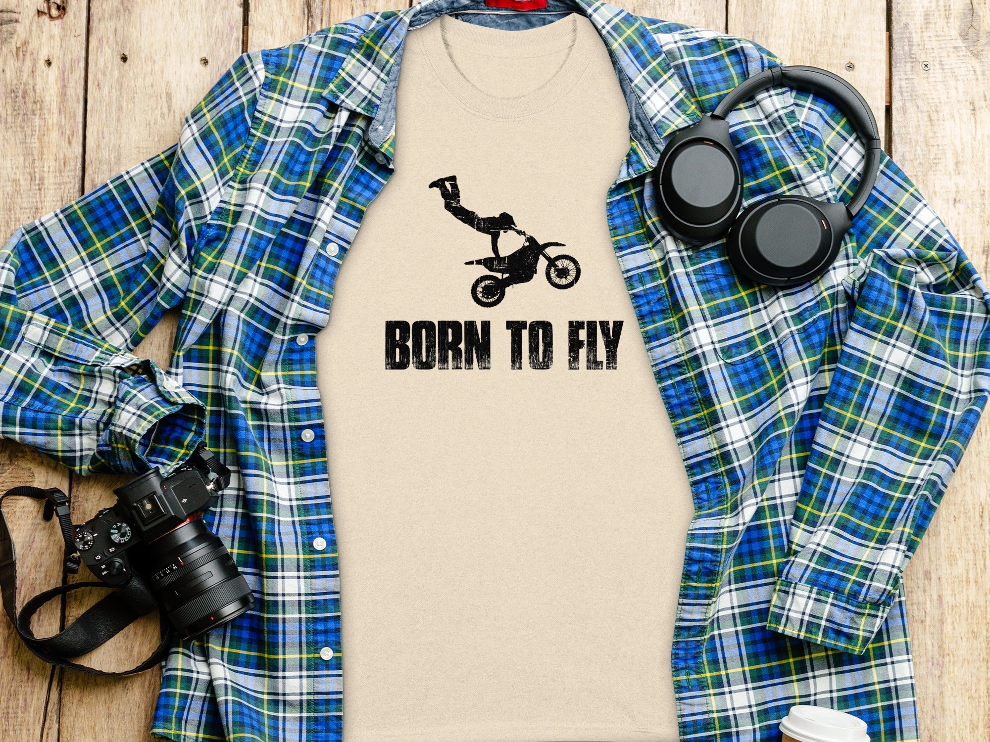 T-shirt with distressed motocross rider graphic and "BORN TO FLY" text.