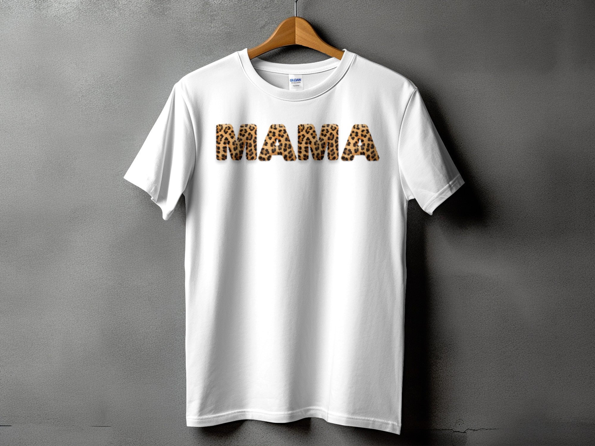 White t-shirt with "MAMA" in leopard print font.