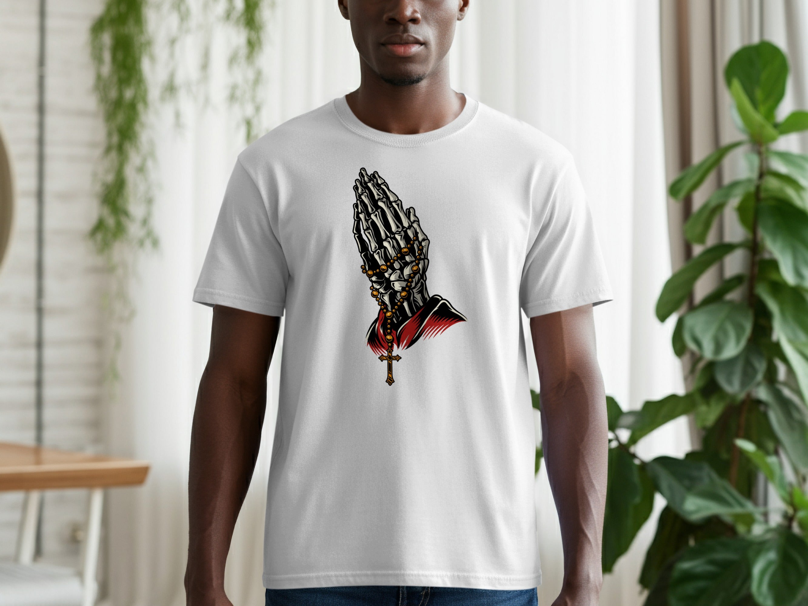 White t-shirt with skeleton hands in prayer and a cross necklace graphic.