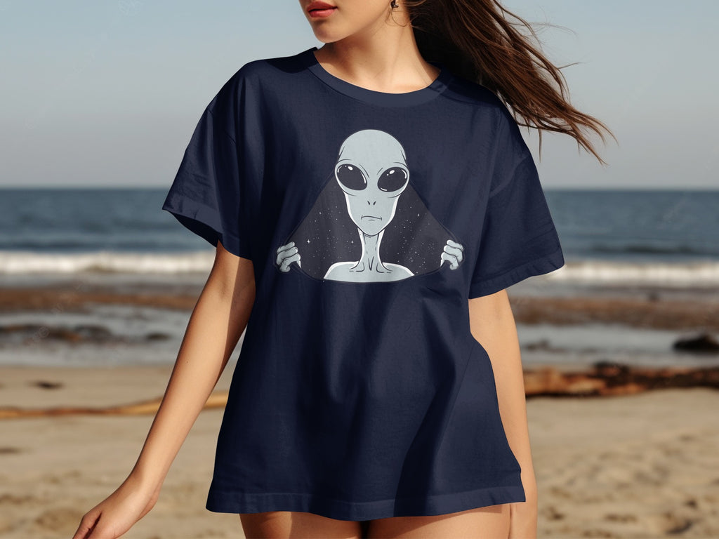 Navy t-shirt with a grey alien peeking from behind stars.
