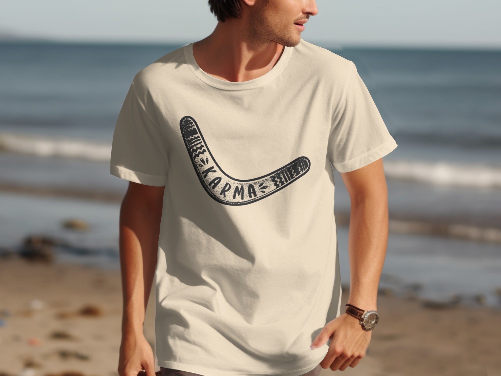 Cream t-shirt with a black boomerang graphic and "KARMA" text on the chest.