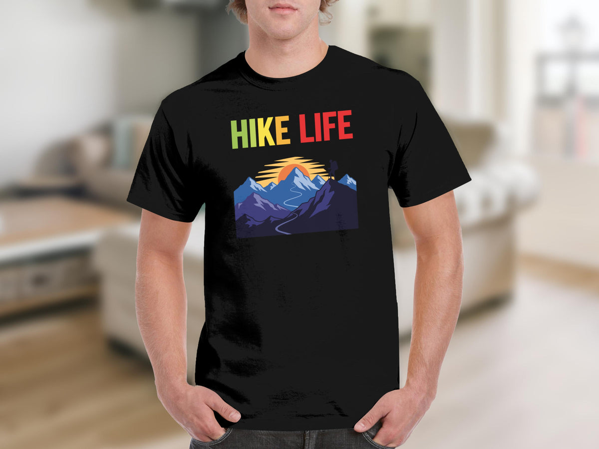 Black t-shirt with colorful "HIKE LIFE" text above mountain and sunset graphic.
