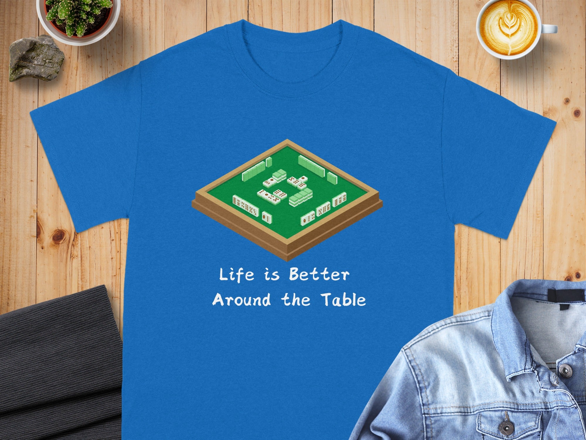 Blue t-shirt with mahjong tiles graphic and "Life is Better Around the Table" text.