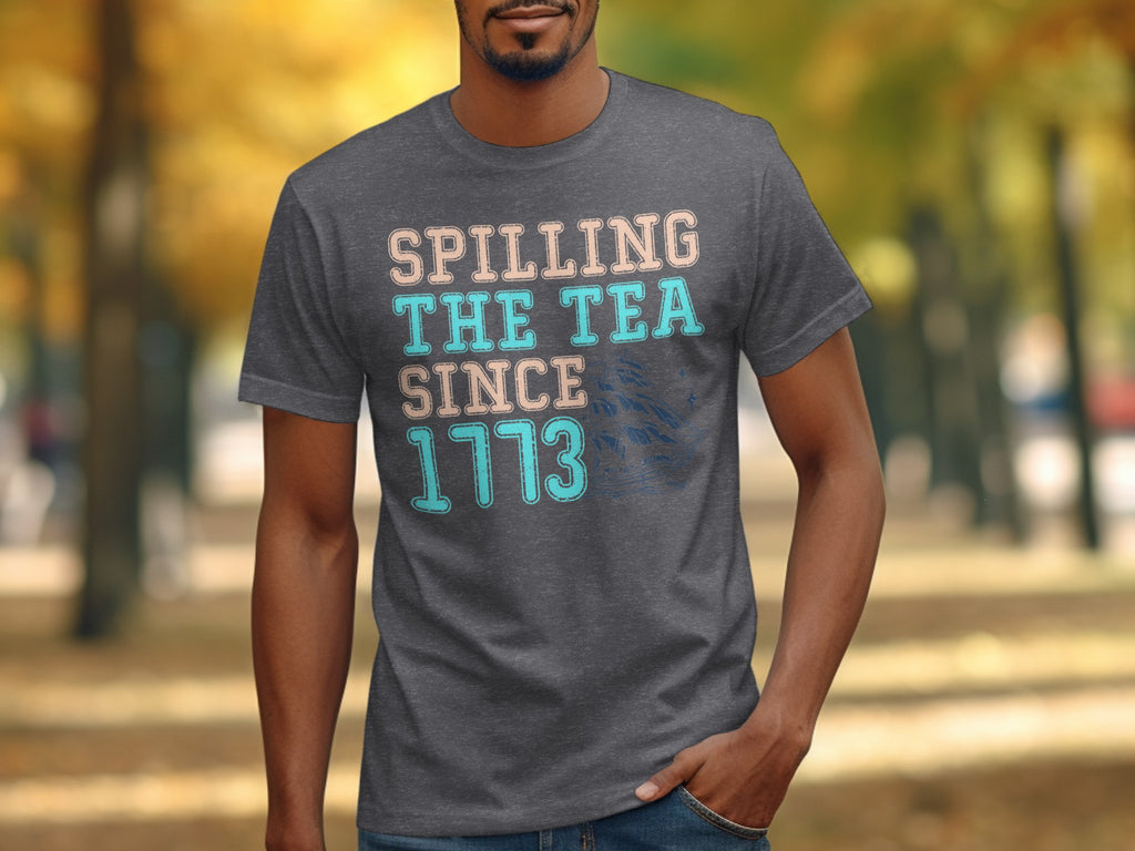 Dark grey t-shirt with text "Spilling The Tea Since 1773" and a ship graphic.
