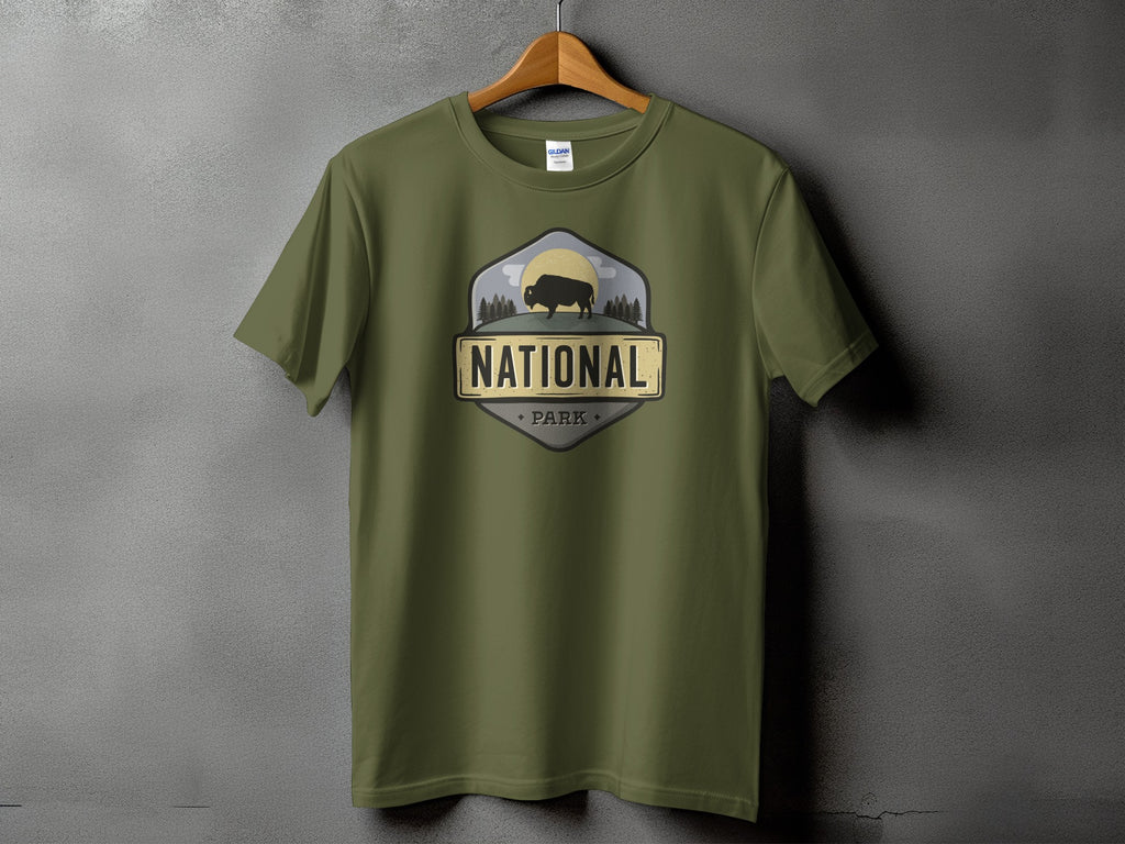 Olive green t-shirt with National Park bison and forest graphic.