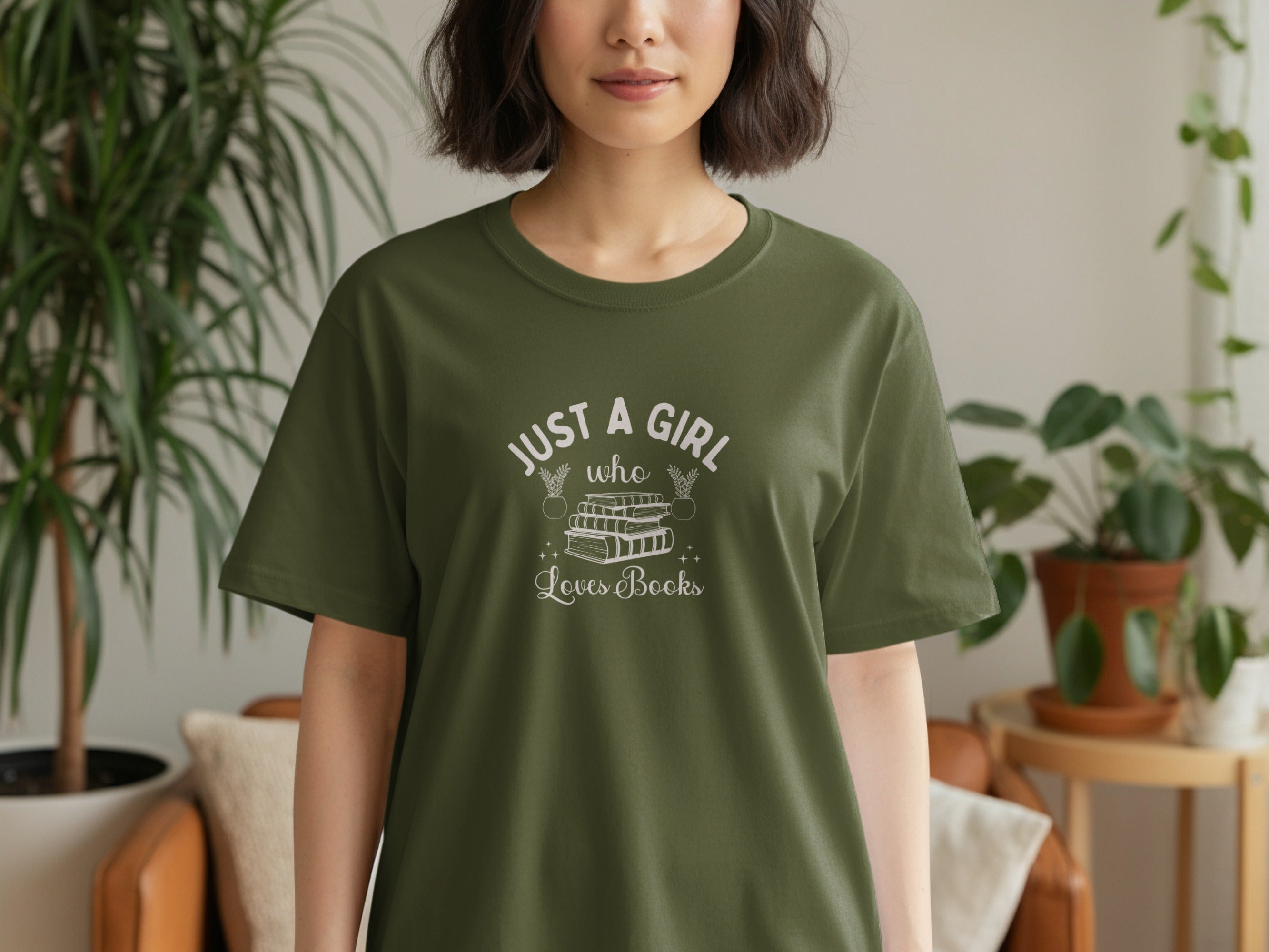 Green t-shirt with "Just A Girl Who Loves Books" text and book graphic.