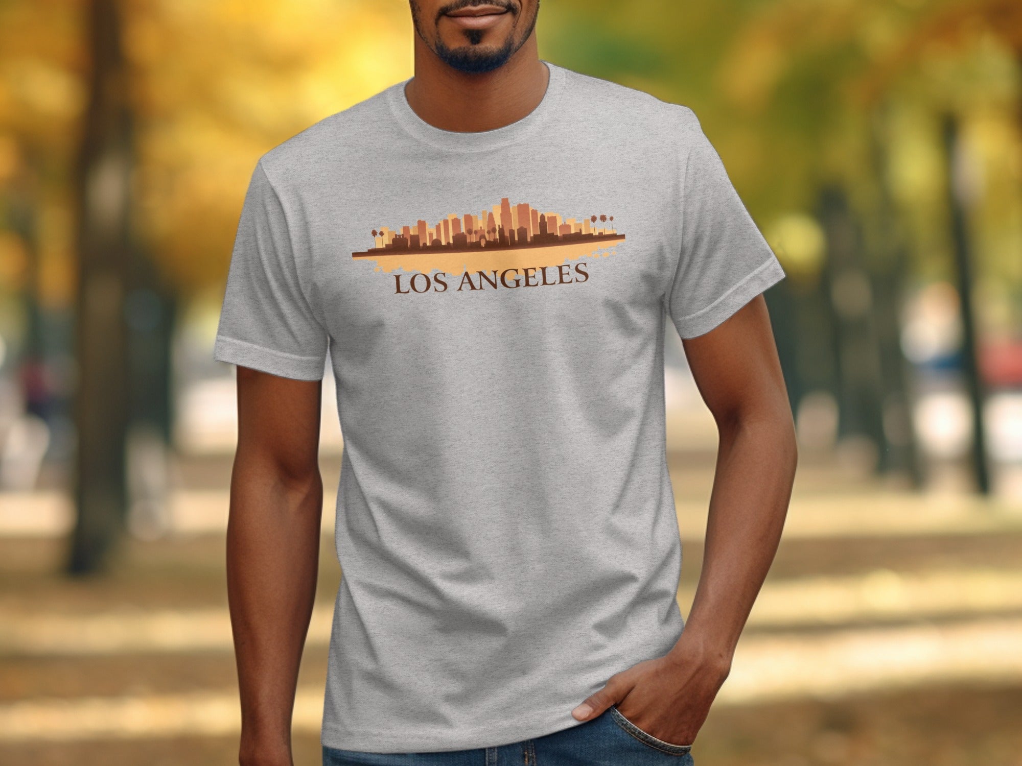 Gray t-shirt with a Los Angeles skyline graphic and text.