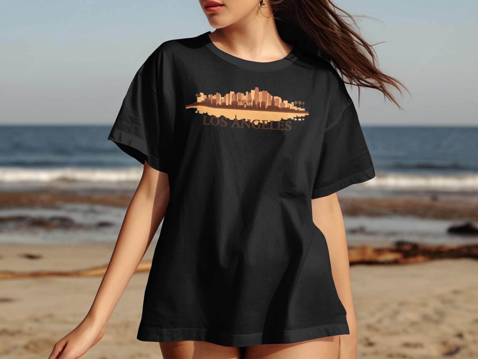 Black t-shirt with Los Angeles skyline graphic and text.